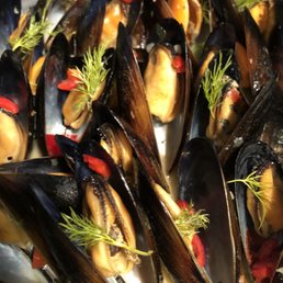 Prince Edward Island mussels with Calabrian chili broth, and herbs