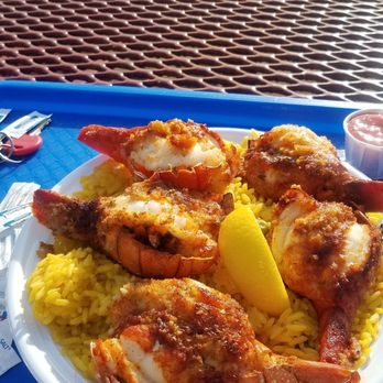 Seafood City - Broiled Lobster Tails & Yellow Rice - Seafood Near Me - Bronx, New York Seafood City - Broiled Lobster Tails & Yellow Rice - Seafood Near Me - Bronx, New York