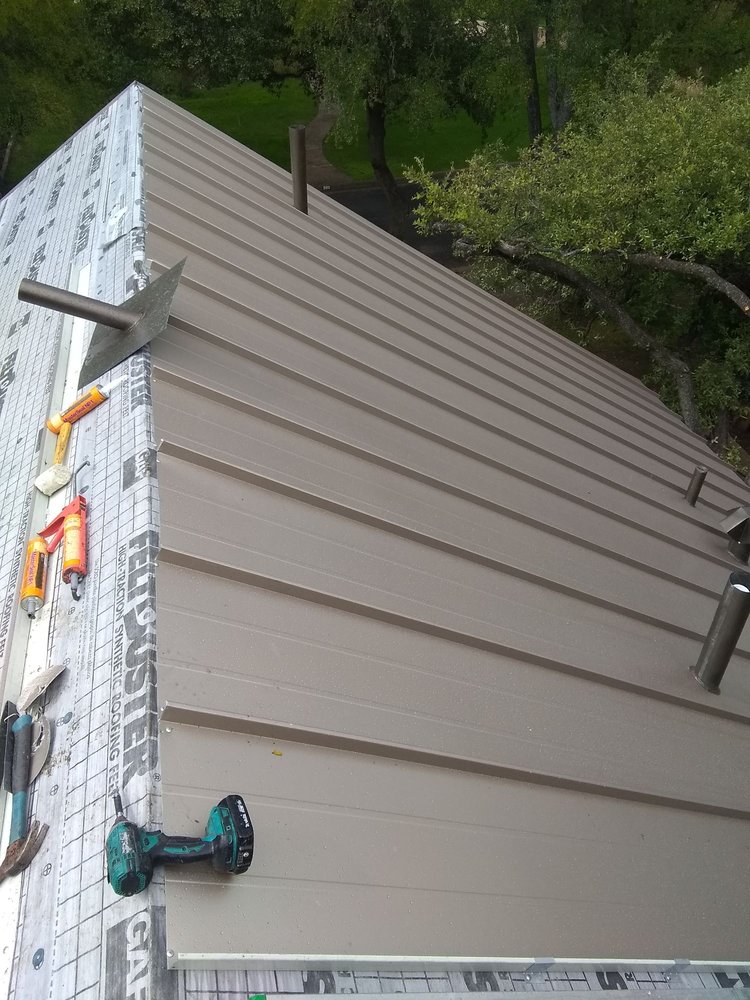 Slide of Camacho Roofing Construction