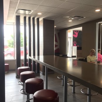 McDonald's - a woman sitting at a table - Burgers Near Me - Sapulpa, Oklahoma