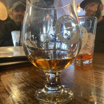 Churchill's Food & Spirits - Bourbon pour - American Near Me - Flint, Michigan