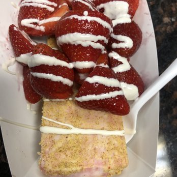The Paleta Bar - Strawberry cheesecake Paleta Dipped in crushed graham crackers with fresh strawberries and white chocolate drizzle. - Ice Cream & Frozen Yogurt Near Me - Albuquerque, New Mexico