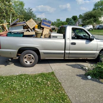 Lovelyxpress - a pick up truck loaded with boxes - Junk Removal & Hauling Near Me Lovelyxpress - a pick up truck loaded with boxes - Junk Removal & Hauling Near Me