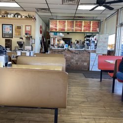 McCarty's Cafe - Inside the cafe. Menu above ordering counter & specials listed on the dry erase board. The ladies working are very nice.