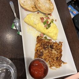 Omelette, hashbrowns, and English muffin Omelette, hashbrowns, and English muffin