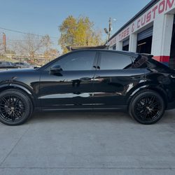 Akins Tires & Wheels - 2025 Porsche Cayenne with the complete chrome, deleted tinted windows, and powdered coated wheels in Satin Black color