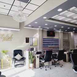 Stylish Nails - Customers waiting with massage  chairs .