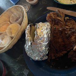 Tommy’s Restaurant and Bar - 12 oz Rib Eye w/ baked potato