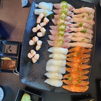 Its Sushi - Left to right: Scallop mayo, squid, yellowtail, garlic salmon, salmon belly - Sushi Bars Near Me - Sacramento, California Its Sushi - Left to right: Scallop mayo, squid, yellowtail, garlic salmon, salmon belly - Sushi Bars Near Me - Sacramento, California