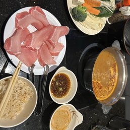 Shabu shabu with pork tenderloin and spicy miso sauce Shabu shabu with pork tenderloin and spicy miso sauce