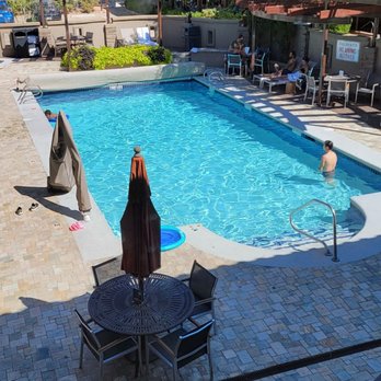 Best Western Plus Canyonlands Inn - The pool, as seen from our room. A hot tub (not seen in this photo) is to the top left. - Hotels Near Me - Moab, Utah