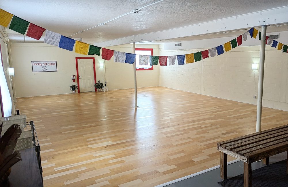Lucky Cat Yoga and Wellness Center Logo