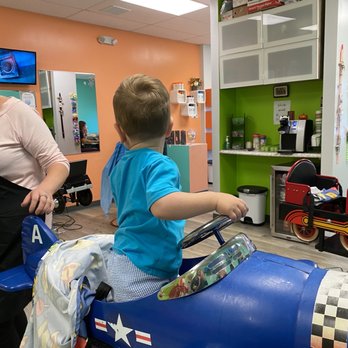 Kidtopia Salon - My son in the plane - Kids Hair Salons Near Me - Midlothian, Virginia