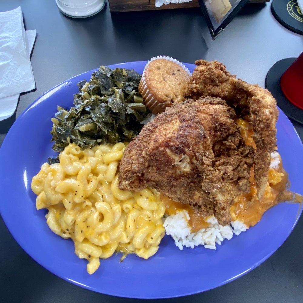 Fried chicken, mac & cheese, rice and gravy , collard green, and corn bread muffin. Fried chicken, mac & cheese, rice and gravy , collard green, and corn bread muffin.