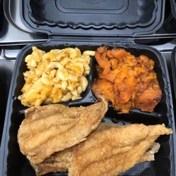 Lady’s Seafood & Soul Food - Fried whiting fish, mac n cheese, and candied yams.