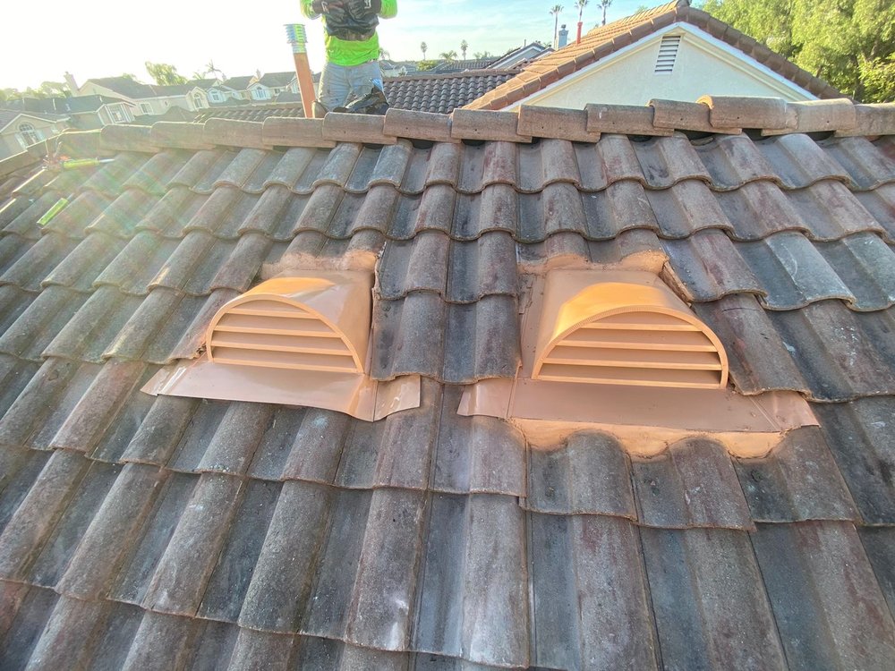 Slide of Spootless Roofing