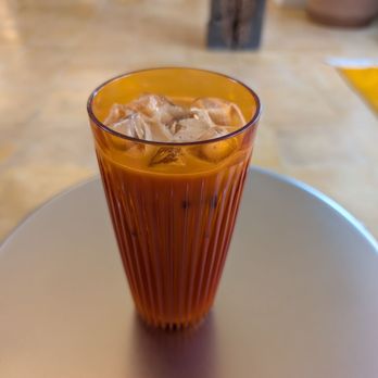 Carpet Cafe - Six Spice Iced Latte with Oat Milk - Coffee & Tea Near Me - Baltimore, Maryland Carpet Cafe - Six Spice Iced Latte with Oat Milk - Coffee & Tea Near Me - Baltimore, Maryland