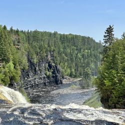 Kakabeka Falls Provincial Park - Standing on a bridge above the falls.