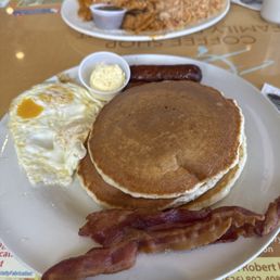 Got me a hotcakes stack combo and my wife got chilaquiles  Really good food