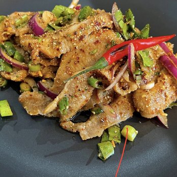 Kiin Thai - a plate of food with meat and vegetables - Thai Near Me - Winnipeg, Manitoba Kiin Thai - a plate of food with meat and vegetables - Thai Near Me - Winnipeg, Manitoba
