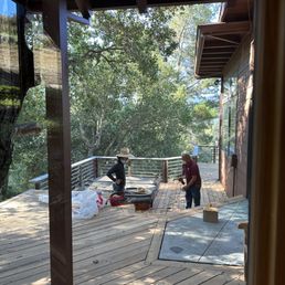 The team covered our windows with plastic prior to prepping and tightening screws in our wrap-around deck. The team covered our windows with plastic prior to prepping and tightening screws in our wrap-around deck.