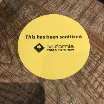 California Pizza Kitchen - sanitization sign - Pizza Near Me - Tampa, Florida