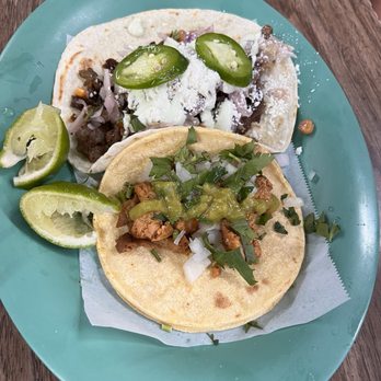 The Taco Man - The Guapo Taco with carne asada and one street taco on corn tortilla with chicken, cilantro, onions, and the green salsa. - Mexican Near Me - Fort Worth, Texas The Taco Man - The Guapo Taco with carne asada and one street taco on corn tortilla with chicken, cilantro, onions, and the green salsa. - Mexican Near Me - Fort Worth, Texas