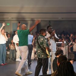Shoreline City - Pastor Earl in Green and the Music staff