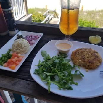 Sand On the Beach - Smoked fish dip (with tortilla chips) and crab cake appetizers. - American Near Me - Melbourne Beach, Florida Sand On the Beach - Smoked fish dip (with tortilla chips) and crab cake appetizers. - American Near Me - Melbourne Beach, Florida
