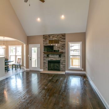 Sauers Construction - an empty living room with a fireplace - General Contractors Near Me - Clarksville, Tennessee Sauers Construction - an empty living room with a fireplace - General Contractors Near Me - Clarksville, Tennessee