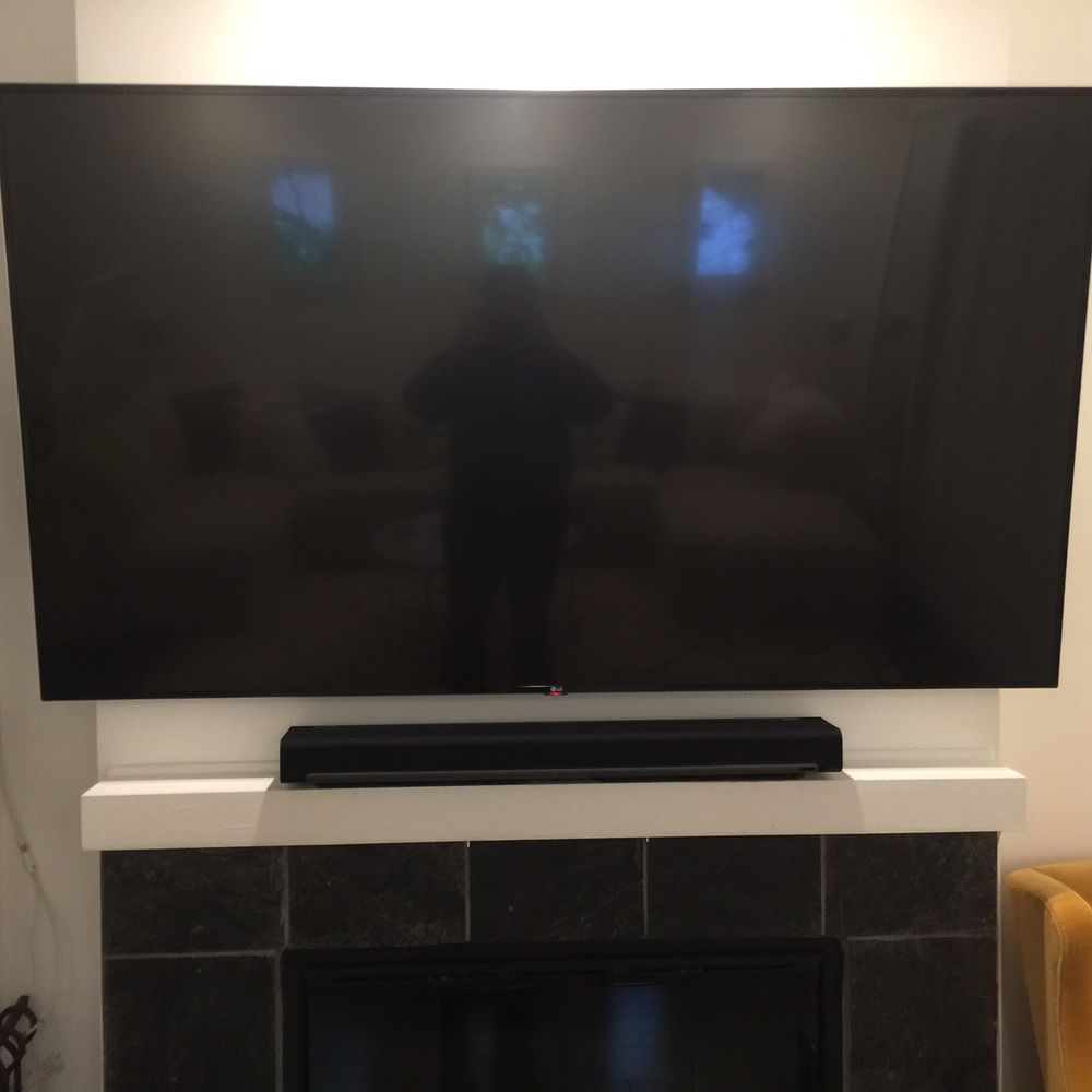 Modtech Design - Nice install Juan helped me with, 75" 4K TV on a full motion bracket over my fireplace w/ sound bar. - Home Theatre Installation Near Me Modtech Design - Nice install Juan helped me with, 75" 4K TV on a full motion bracket over my fireplace w/ sound bar. - Home Theatre Installation Near Me