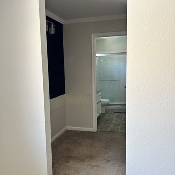 Fo Remodeling - Bathroom before (half wall was just a vanity at one point and then small single sink and shower) - General Contractors Near Me - Elk Grove, California
