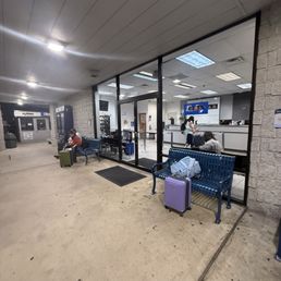 People waiting over an hour to get a rental car