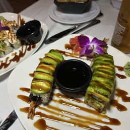 Shrimp tempura roll with avocado. Shrimp tempura roll with avocado.