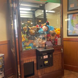 a vending machine with stuffed animals