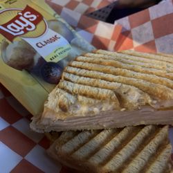 Arcade Tavern - Turkey panini with tomato and swiss