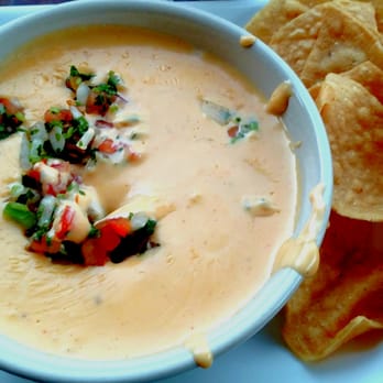 Fuego's Saloon - Queso with fresh chips. - Cocktail Bars Near Me - Houston, Texas