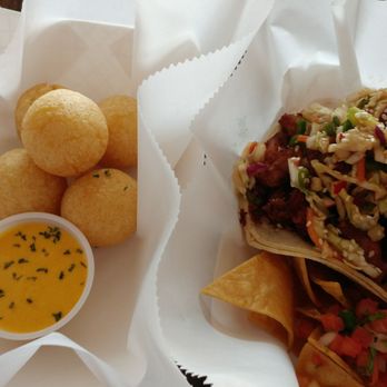 ASADA - Yuca balls and chicken karaage taco - Latin American Near Me - Greenville, South Carolina ASADA - Yuca balls and chicken karaage taco - Latin American Near Me - Greenville, South Carolina