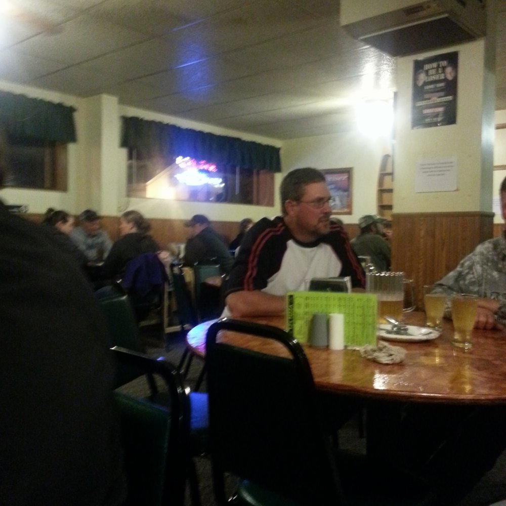 TJ's Pizza - a group of people sitting at a table - Pizza Near Me - Clermont, Iowa TJ's Pizza - a group of people sitting at a table - Pizza Near Me - Clermont, Iowa