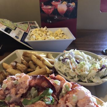 99 Restaurants - Lobster roll with sides of slaw and fries - American Near Me - Pittsfield, Massachusetts