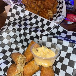 The Evangeline Lounge - Boudin egg rolls & waffle fries.