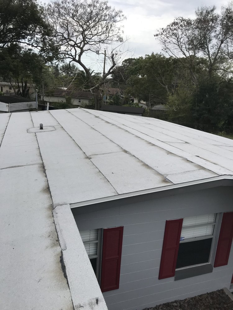 Slide of Menzel Roofing Services