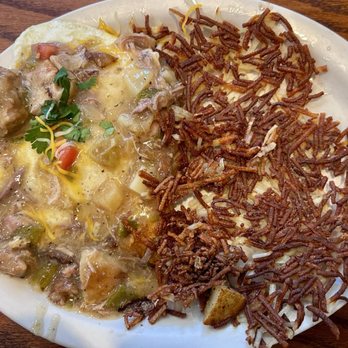 Juan del Fuego - Enchiladas and Eggs topped with Green Chili Stew - Diners Near Me - Norman, Oklahoma Juan del Fuego - Enchiladas and Eggs topped with Green Chili Stew - Diners Near Me - Norman, Oklahoma