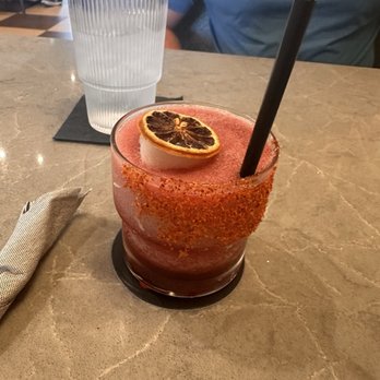 Farmand's Kitchen - Frozen blackberry margarita with a Tajin rim - Wine Bars Near Me - Austin, Texas