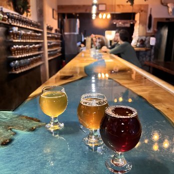Arktos Meadery - three glasses of beer on a bar - Wine Tasting Room Near Me - Grand Rapids, Michigan
