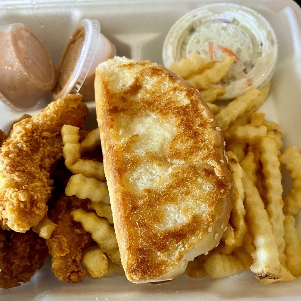 Raising Cane's Chicken Fingers - THE BOX COMBO - 4 Chicken Fingers, Crinkle-Cut Fries, 1 Cane's Sauce, Texas Toast, Coleslaw, Regular Fountain Drink - Chicken Shop Near Me - Temple, Texas