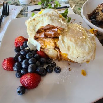 Rival Coffee - The Sandwich. Crispy French toast with corn flakes, jalapeño passion fruit jelly, carnitas, 2 eggs and ham - Coffee & Tea Near Me - Murrieta, California Rival Coffee - The Sandwich. Crispy French toast with corn flakes, jalapeño passion fruit jelly, carnitas, 2 eggs and ham - Coffee & Tea Near Me - Murrieta, California