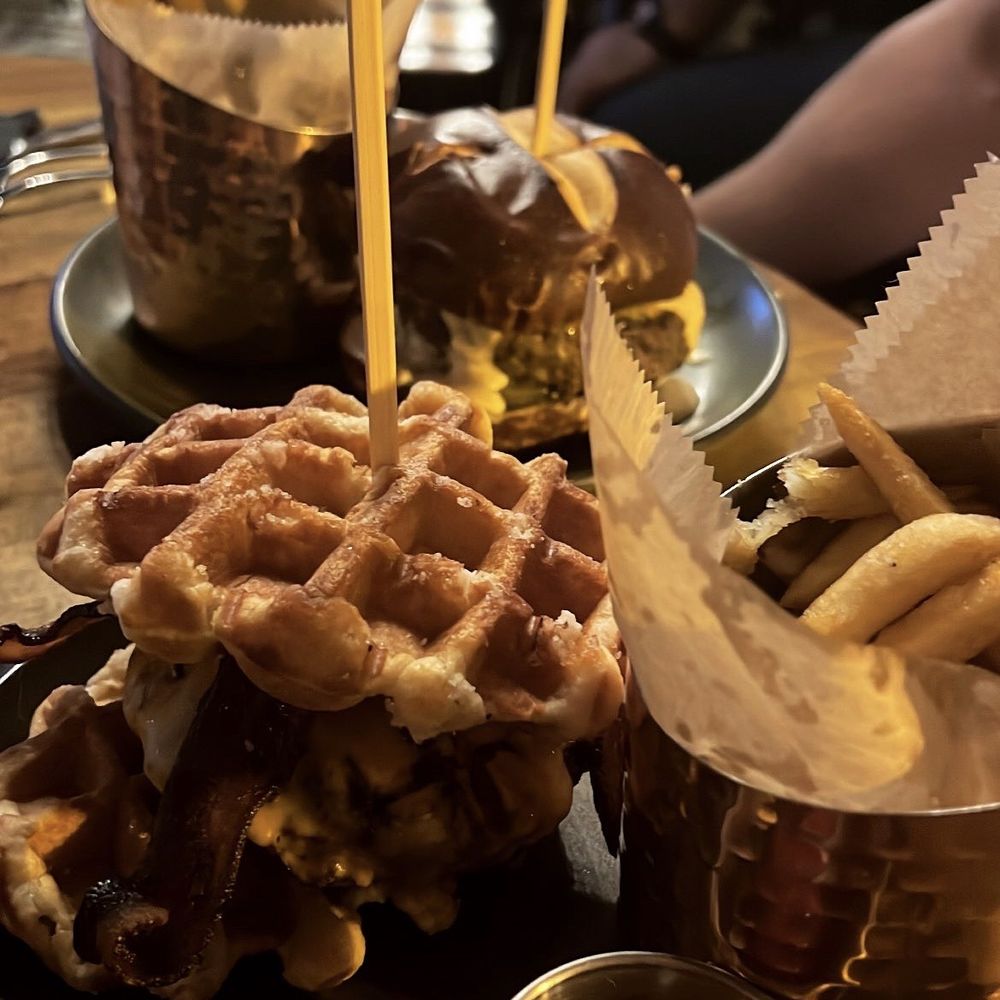 The Stubborn Mule - Waffle burger (front) and Nacho burger (back) - New American Near Me - Orlando, Florida The Stubborn Mule - Waffle burger (front) and Nacho burger (back) - New American Near Me - Orlando, Florida