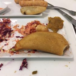 El Venezolano - remnants of my empanadas,tequenos and tostones. First time with Venezuelan food and it is so good here!