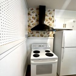 Guiding Builders - Kitchen renovation: refinished cabinets, installation of new butcher block countertop, tiling, painted interior